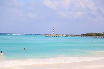 beach and lighthouse cancun mexico