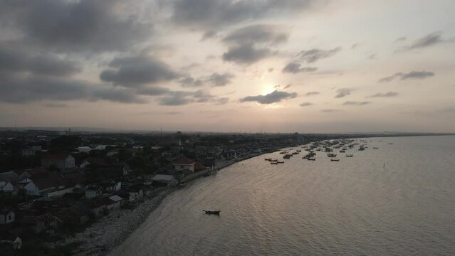 sunset view on the beach. aerial view of the harbor at sunset