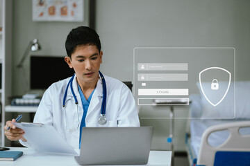 male doctor typing login and password in the concept of cyber security, information security, data...