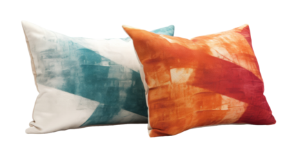 Two vibrant and colorful pillows resting side by side on a cozy couch