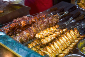 Delicious Brazilian barbecue, big meat skewers