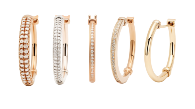 A quartet of unique hoop earrings in different styles and materials on display