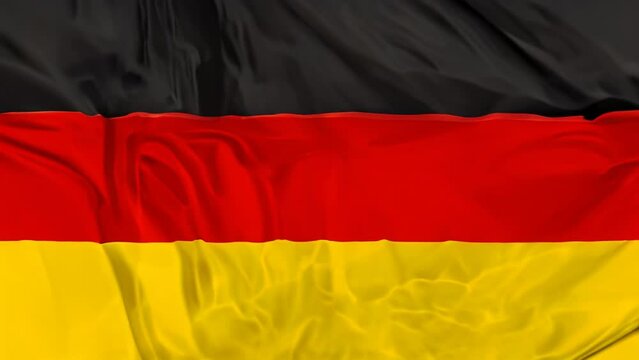 Close-up view of the german flag with a silky, smooth texture and vibrant colors. 3D illustration