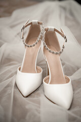 Bride's shoes on a veil 