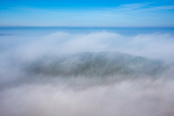 Amazing aerial forest landscape over fog. Poland