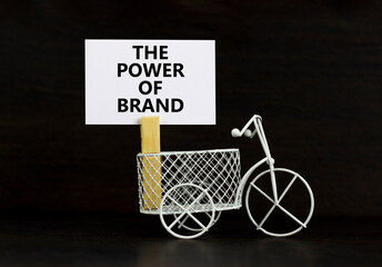 The power of brand symbol. Concept words The power of brand on beautiful white paper on clothespin....