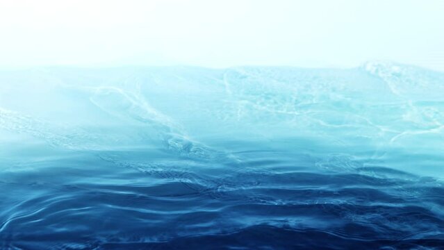 Super Slow Motion Shot of Waving Blue Water Surface at 1000fps.