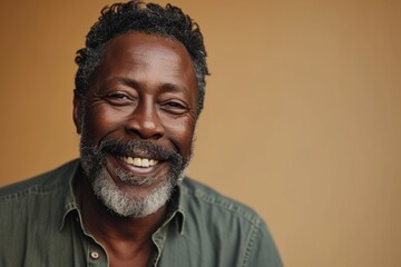 Portrait of a senior African man smiling and looking at the camera