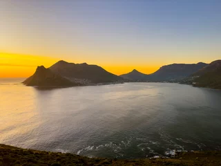 Fototapeten Hout Bay coastal mountain landscape at sunset in Cape Town. © Sunshine Seeds
