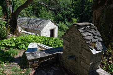 View of a traditional stone watermill and fountain near the village of Amarantos at Mount Gramos in northern Greece. - 774743077