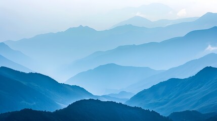Serene and Misty Mountain Valley Landscape with Layers of Hazy Blue Ridges Capturing the Grandeur of the Wilderness - obrazy, fototapety, plakaty