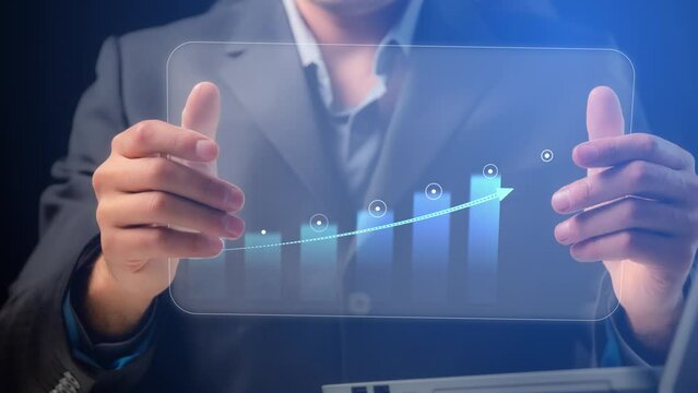 Cg. A moving graph with dot values on the transparent screen of a demonstration tablet in the hands of a business trainer