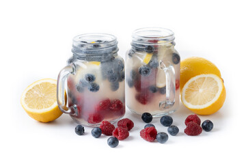 Fresh berry drink with blueberries and raspberries isolated on white background.