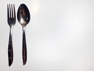 Spoon and fork isolated in white background