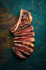 Sliced grilled meat steak Rib eye medium rare set, on wooden serving board. Top view. - 774777872