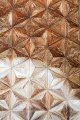 Star shaped weathered wooden panel design close up