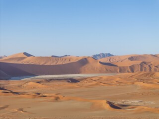 Drone panorama over the Sossusvlei and the surrounding dunes of the Namib Desert in Namibia during...