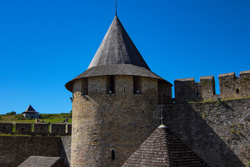 Tower of the Ancient fortress in Khotyn, West Ukraine. Medieval fortification on the banks of the Dniester River, one of the most famous and largest castles in Ukraine.