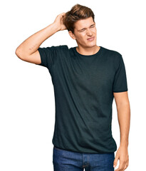 Handsome caucasian man wearing casual clothes confuse and wonder about question. uncertain with doubt, thinking with hand on head. pensive concept.