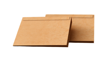 Two brown envelopes neatly stacked on top of each other in a simple yet intriguing composition