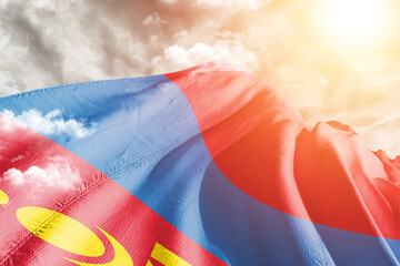 Mongolia national flag cloth fabric waving on beautiful cloudy Background.