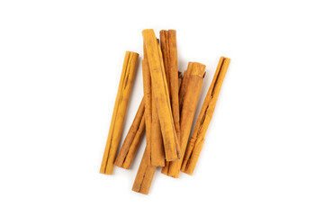 Ceylon cinnamon.Cinnamon sticks isolated on white background. Cinnamon roll and powder. Spicy spice for baking, desserts and drinks. Fragrant ground cinnamon. Close-up. Place for text. copy space