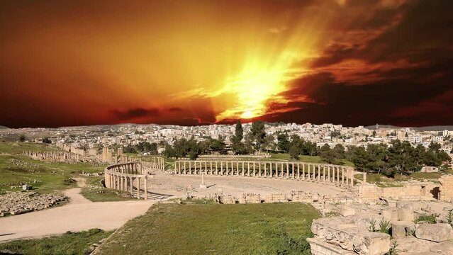 Forum (Oval Plaza) in Gerasa (Jerash), Jordan. Was built in the first century AD. Against the background of the sunset, 4K, time lapse  