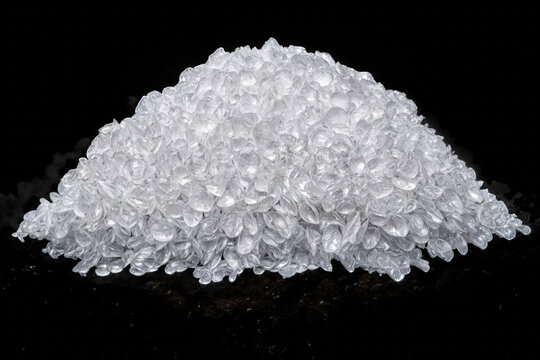 Synthetic drugs mephedrone concept. Narcotic and psychotropic drugs concept. White crystal powder on black background