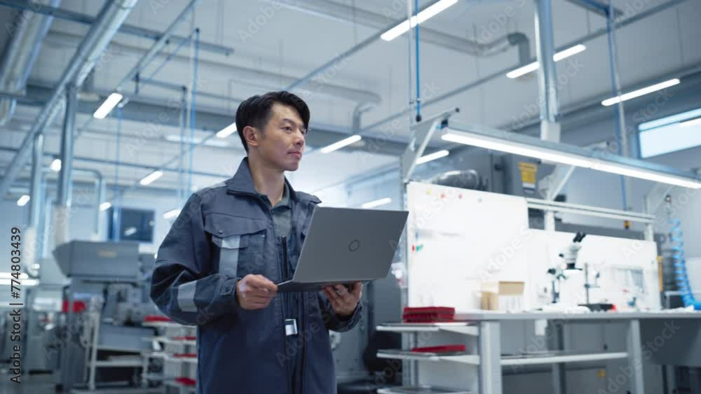 Poster chief engineer walking through the hall in a modern factory with manufacturing machinery and product