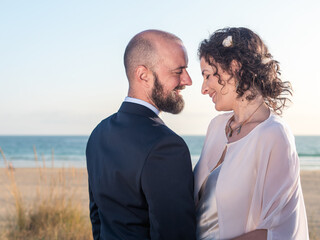 Couple Embracing on Serene Beach