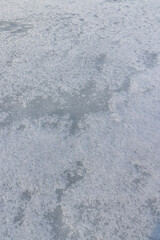 the ice-covered surface of the river in the winter season