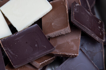 white, bitter and milk chocolate pieces