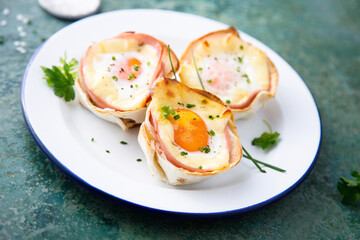 Baked eggs with bacon and chives