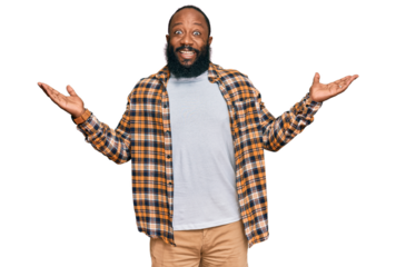 Young african american man wearing casual clothes celebrating victory with happy smile and winner expression with raised hands