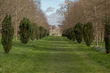 Fototapeta na wymiar Sunny walk around Petworth House gardens, West Sussex, England, April 2024