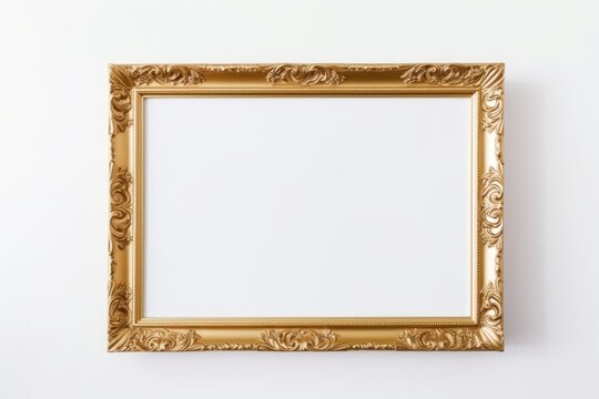 Classic golden picture frame with intricate designs isolated on a clean white background. Ornate Golden Picture Frame on White