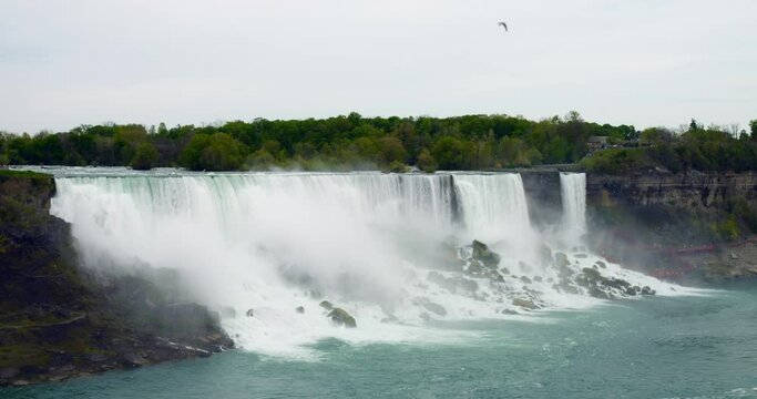 Power and awe from heights of Niagara Falls, famous for its suicides. Beauty and grandeur of nature in place of suicide. Famous natural landmark with negative suicidal connotation. Life concept