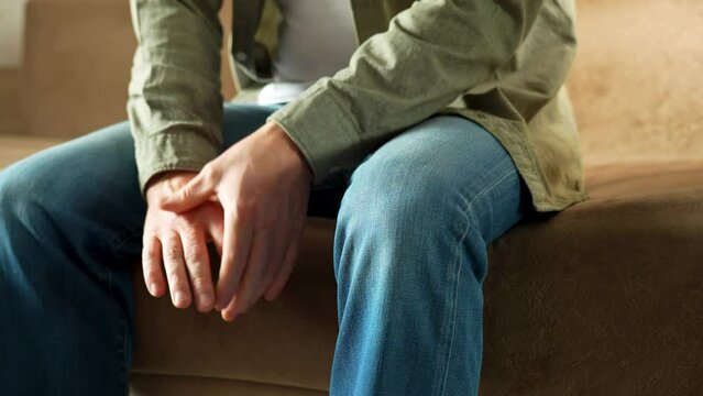 Close-up of Man With Parkinson Disease Symptom.