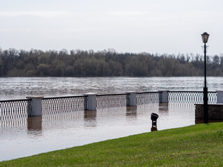 flooded embankment of the river in the spring