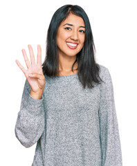 Beautiful asian young woman wearing casual clothes showing and pointing up with fingers number four...