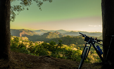 Sunrise in mountain area with biking