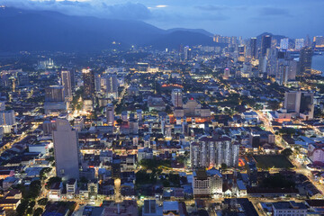 Fototapeta na wymiar A view of the cityscape of Penang in Malaysia during the blue hour of the day.