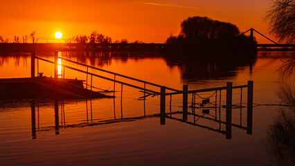 Sunset with reflections near Metten, Danube, Deggendorf, Bavaria, Germany