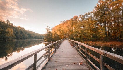 autumn nature landscape lake bridge in fall forest