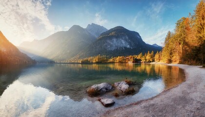 fantastic autumn panorama on hintersee lake colorful morning view of bavarian alps on the austrian border germany europe beauty of nature concept background