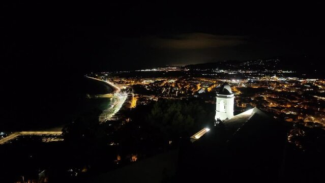 Panoramic small Spanish coastline city view at night, Blanes, 4K
