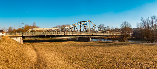 Sunny winter day with a steel bridge near Landau, Isar, Dingolfing-Landau, Bavaria, Germany
