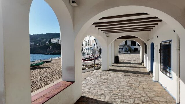 Beautiful walk in the promenade in a Spanish coastline town Calella de Palafrugell in Costa Brava, 4K