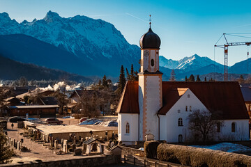 Church on a sunny winter day at Wallgau, Garmisch-Partenkirchen, Werdenfelser Land, Bavaria, Germany