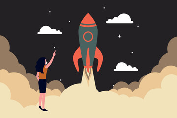 The girl is pointing at the rocket.